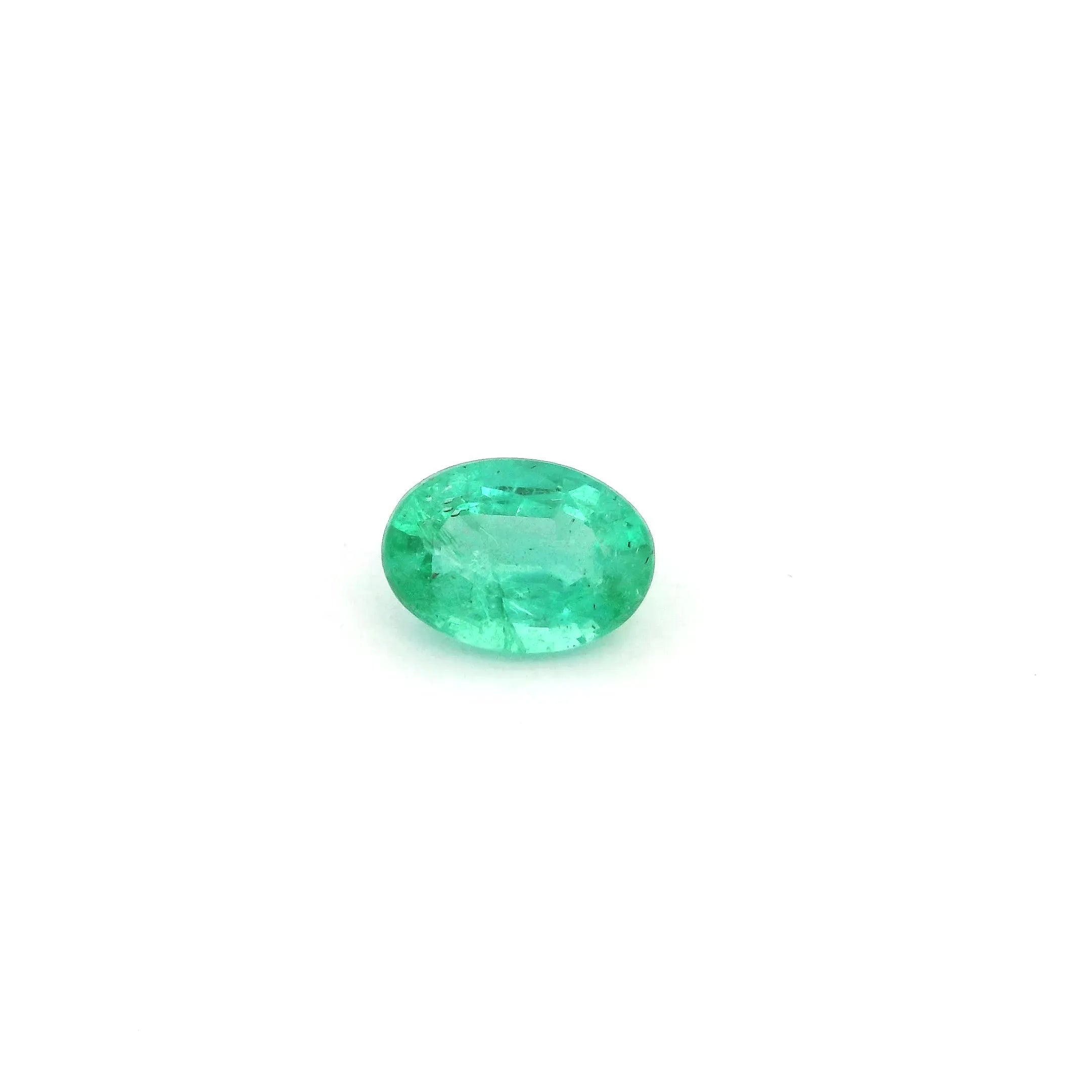 0.71ct Oval Natural Emerald (Colour Green, Clarity Slightly Included, Cut Faceted)